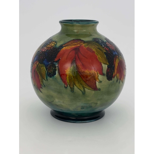 880 - William Moorcroft, a Flambe Leaf and Blackberry vase, circa 1935, spherical form, impressed marks an... 