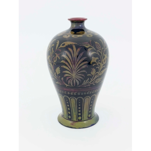 895 - Bernard Moore, a lustre vase, circa 1920, Meiping form, decorated with a central band of rosette and... 