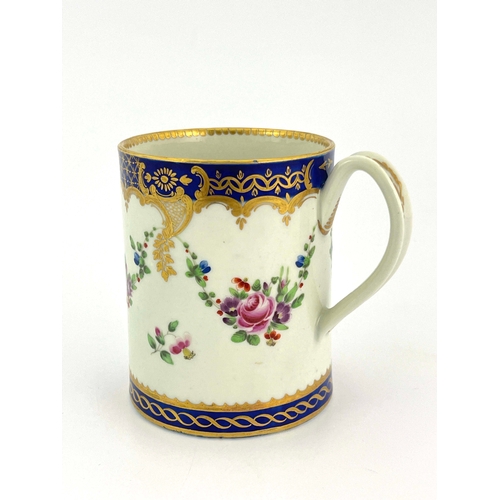 1000 - A Worcester polychrome mug, crescent mark, circa 1780, cylindrical can form, painted with floral gar... 