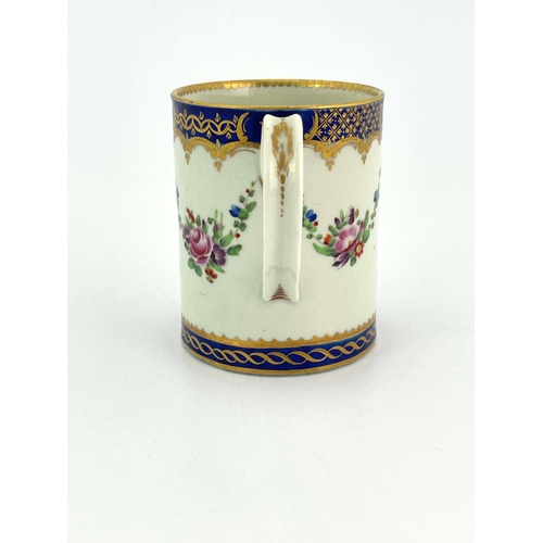 1000 - A Worcester polychrome mug, crescent mark, circa 1780, cylindrical can form, painted with floral gar... 