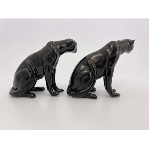 930 - A Royal Worcester pair of figurines, modelled as black panthers, printed marks, 9cm high (2)