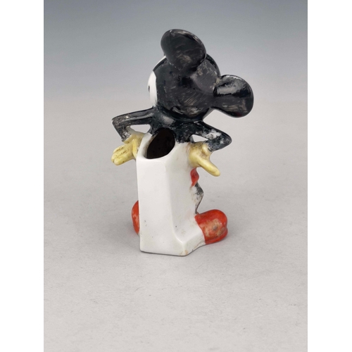 935 - Maw and Co for Walt Disney, a porcelain toothbrush holder, circa 1934, modelled as Mickey Mouse, sta... 