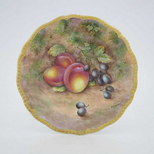 941 - E Townsend for Royal Worcester, a fruit painted plate, ogee gadrooned rim, decorated with plums and ... 