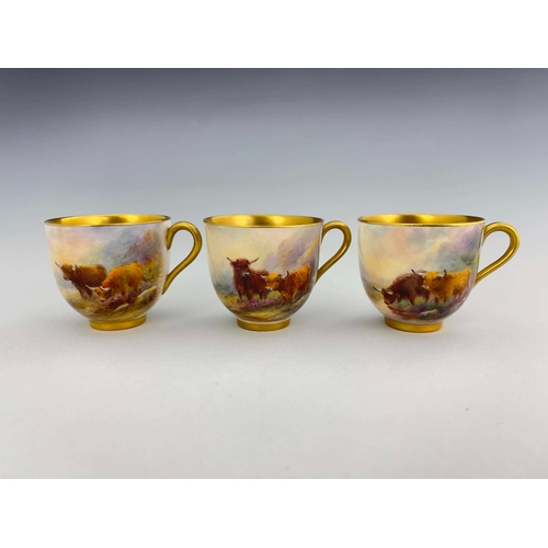 946 - Harry Stinton for Royal Worcester, a set of three Highland cattle painted cups and saucers, gilt int... 