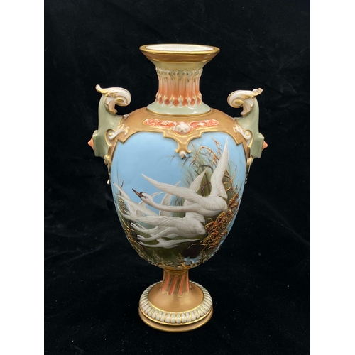 948 - Charles Baldwyn for Royal Worcester, a swan painted vase, 1902, twin handled pedestal form, decorate... 