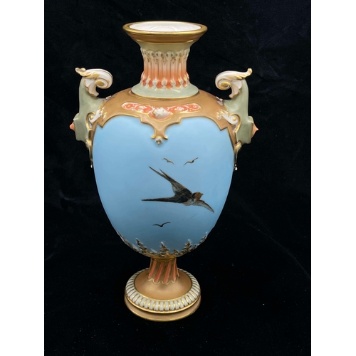 948 - Charles Baldwyn for Royal Worcester, a swan painted vase, 1902, twin handled pedestal form, decorate... 