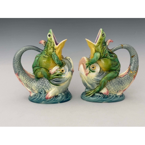 952 - A pair of Minton majolica cream jugs, circa 1872, each modelled as an open mouthed frog seated astri... 