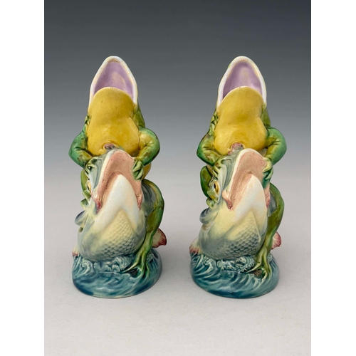 952 - A pair of Minton majolica cream jugs, circa 1872, each modelled as an open mouthed frog seated astri... 