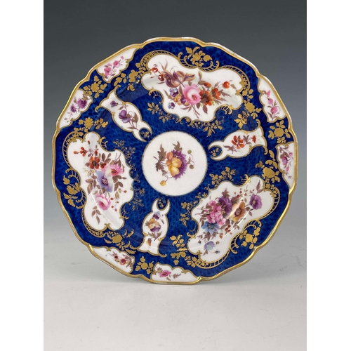 956 - A Worcester Flight Barr and Barr scale blue plate, circa 1820, painted with floral bouquets in gilt ... 