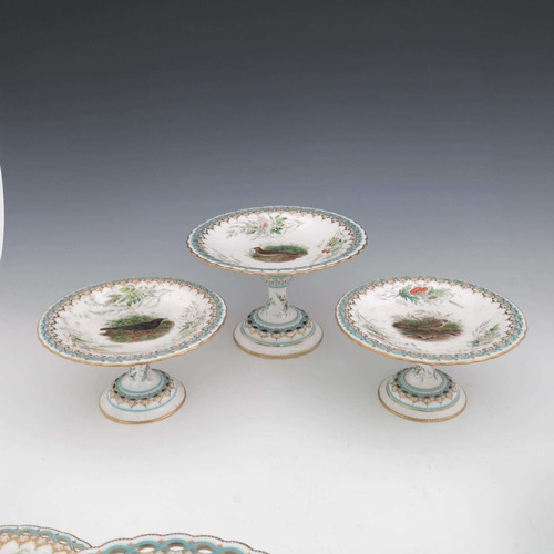 957 - A Worcester Royal Porcelain part dessert service, circa 1860s, painted with various birds in the sty... 