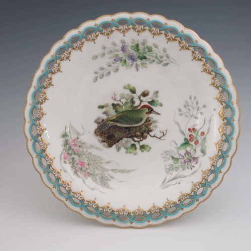 957 - A Worcester Royal Porcelain part dessert service, circa 1860s, painted with various birds in the sty... 