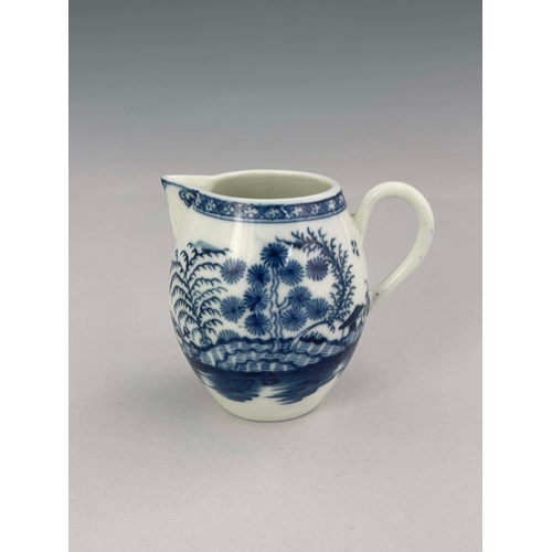 958 - A Caughley blue and white robin beak jug, circa 1775, painted in the Rock Strata Island pattern, bar... 