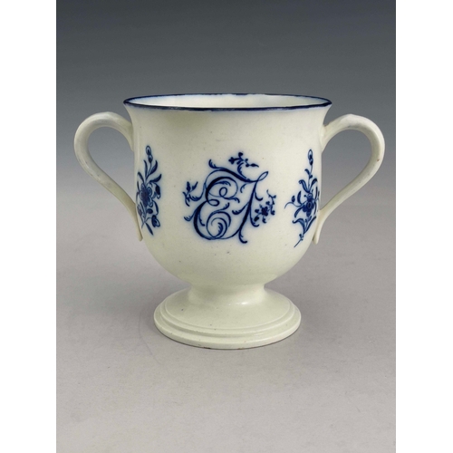 962 - A Caughley blue and white twin handled pedestal cup, circa 1782, Iron Bridge transfer design to one ... 