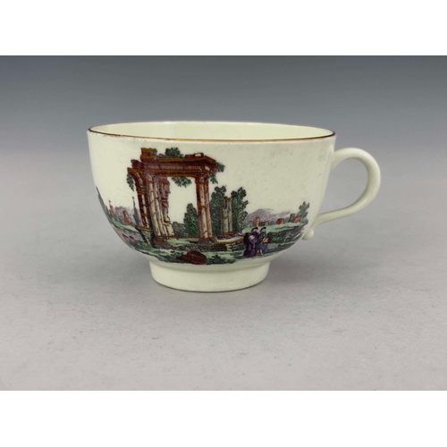 965 - A Worcester black printed and coloured tea cup, circa 1770, Classical ruins, highlighted in gilt, po... 