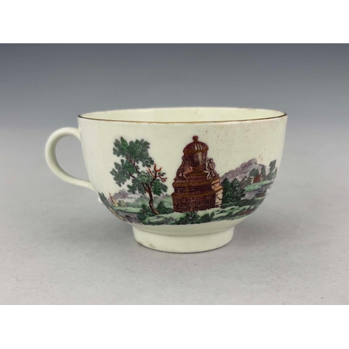 965 - A Worcester black printed and coloured tea cup, circa 1770, Classical ruins, highlighted in gilt, po... 