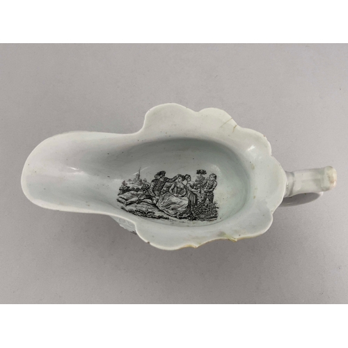 966 - A Worcester black printed high footed sauce boat, circa 1754/55, relief moulded pedestal helmet form... 