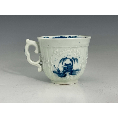 969 - A Worcester blue and white relief moulded coffee cup, workman's mark, circa 1755, Fisherman and Will... 