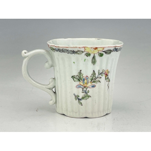 970 - A Worcester polychrome coffee cup, workman's mark, circa 1752-1754, flared and fluted, painted with ... 