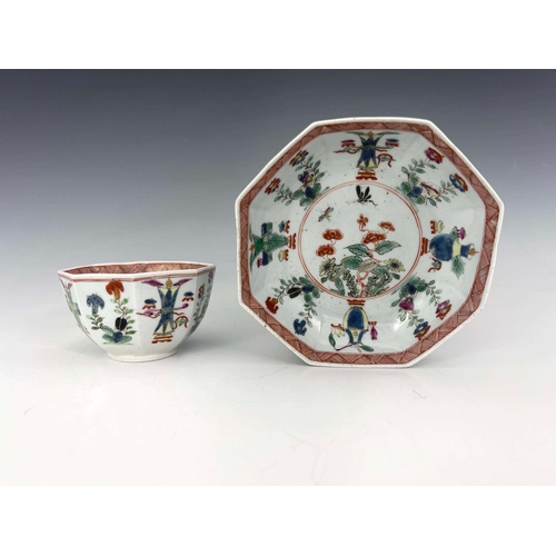 977 - A Worcester polychrome tea bowl and saucer, black workman's marks, circa 1753-55, octagonal from pai... 