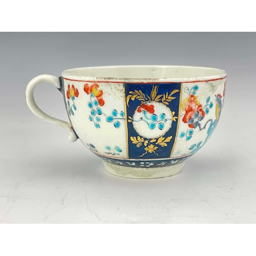 986 - A Worcester polychrome teacup, square mark, circa 1768, Rich Queen's pattern, four Kakiemon enamelle... 