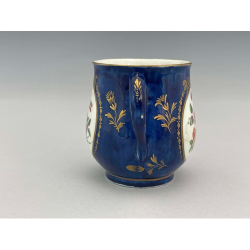 996 - A Worcester powder blue polychrome custard cup, crescent mark, circa 1770, baluster form, painted wi... 