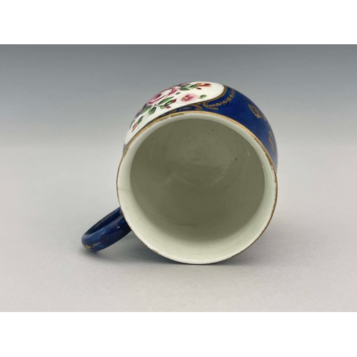 996 - A Worcester powder blue polychrome custard cup, crescent mark, circa 1770, baluster form, painted wi... 