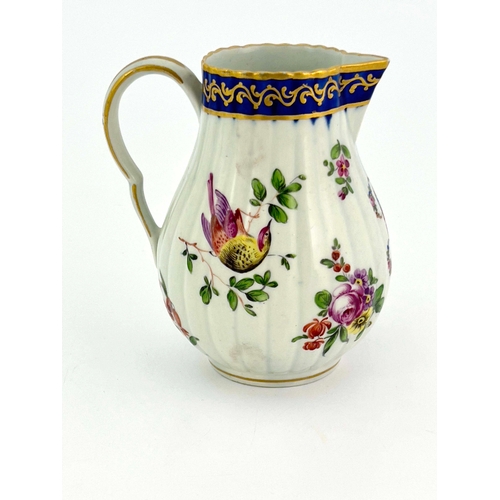 1002 - A Worcester James Giles polychrome jug, circa 1768, sparrow beak reeded baluster form, painted with ... 