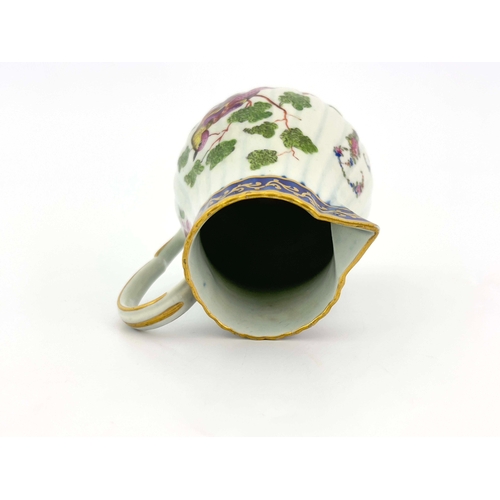 1002 - A Worcester James Giles polychrome jug, circa 1768, sparrow beak reeded baluster form, painted with ... 