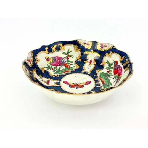 1006 - A Worcester scale blue bowl, square mark, circa 1770, double ogee form with serpentine rim, painted ... 