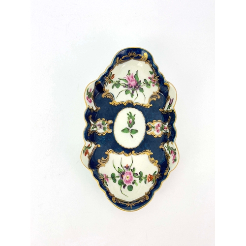 1007 - A Worcester scale blue tray, crescent mark, circa 1770, lobed navette form, painted with European fl... 