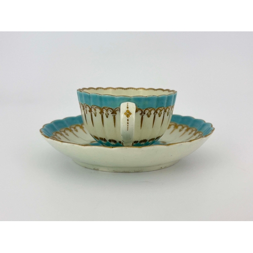 1024 - A Worcester enamelled and gilded tea cup and saucer, circa 1775, reeded and fluted, decorated with t... 