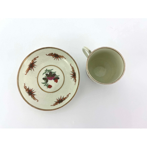 1025 - A Worcester polychrome coffee cup and saucer, circa 1775, Thunder and Lightning pattern, painted wit... 