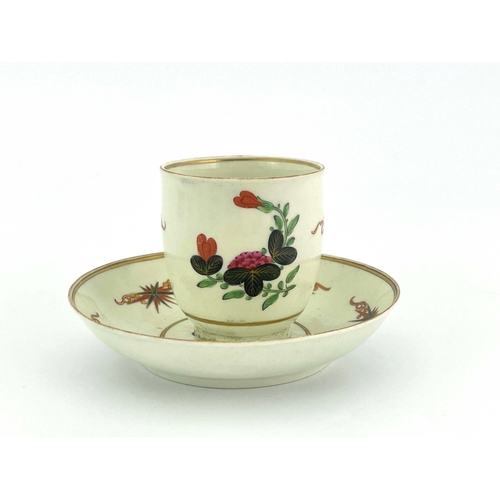 1025 - A Worcester polychrome coffee cup and saucer, circa 1775, Thunder and Lightning pattern, painted wit... 