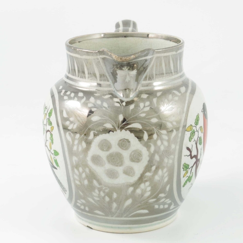 1084 - A silver lustre pearl ware pottery jug, globular form, circa 1820,  resist decorated with flowers an... 