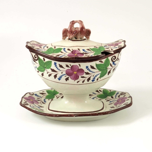 1086 - An early 19th century pearlware tureen and cover on fixed stand, circa 1815, boat form Regency style... 