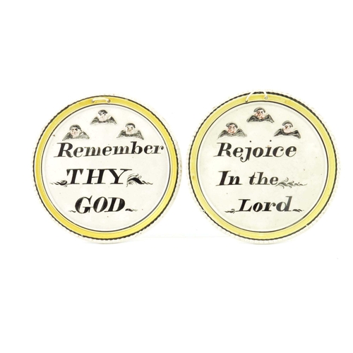 1089 - Two early 19th century wall plaques, circular form, each with painted verse below three, moulded che... 