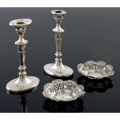 188 - A pair of George V silver candlesticks, William Hutton and Sons, Birmingham 1913, Neoclassical oval ... 