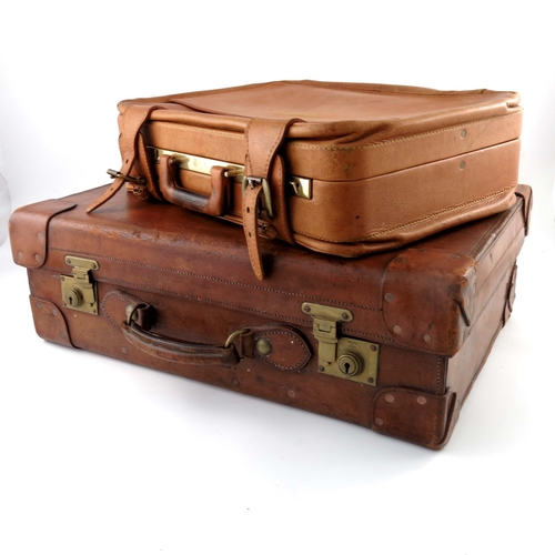 484 - Vintage Luggage, a John Pound & Co tan leather suitcase, early 20th Century, stitched with flush stu... 