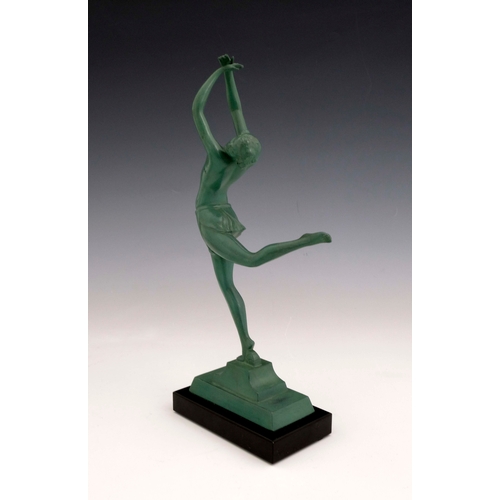 528 - An Art Deco patinated art metal figure of a dancer, circa 1925, modelled with arms raised, on black ... 