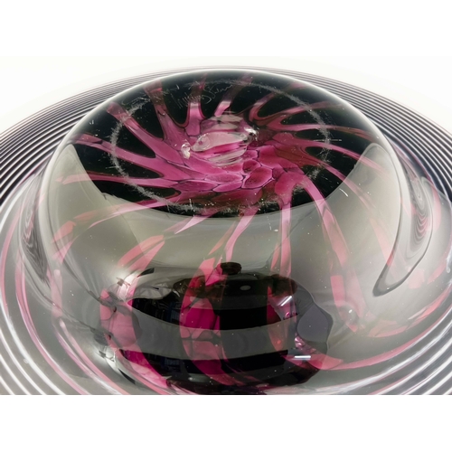 817A - Anthony Stern. a studio glass bowl, broad rimmed dish form, marbled amethyst with opaque spiral bord... 