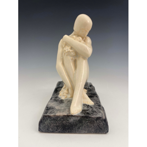 865 - L Rossat for Marcel Guillard, an Art Deco ceramic figure of a nude woman, circa 1930, modelled sitti... 