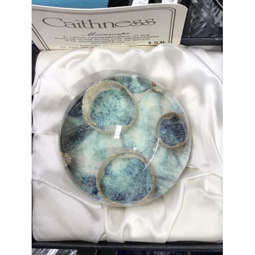 42 - A Caithness paperweight, Moonscape, cased