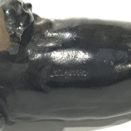 147 - An Austrian patinated cast bronze model of a Dachshund, bearing marks Geschutzt, 16cm long