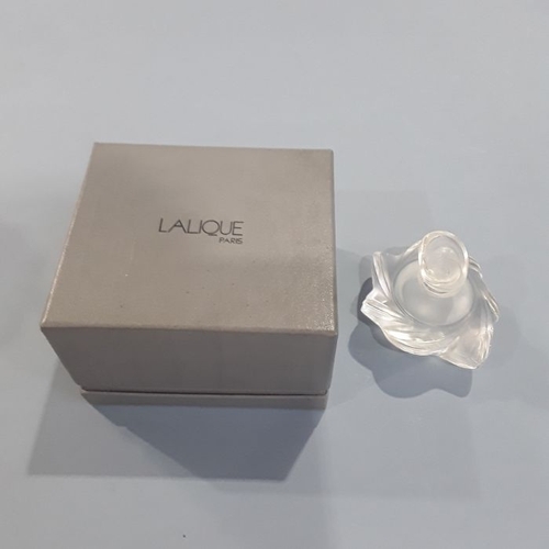 270 - A Lalique frosted glass perfume bottle and stopper, irregular pinwheel wave form, 8.5cm high, engrav... 