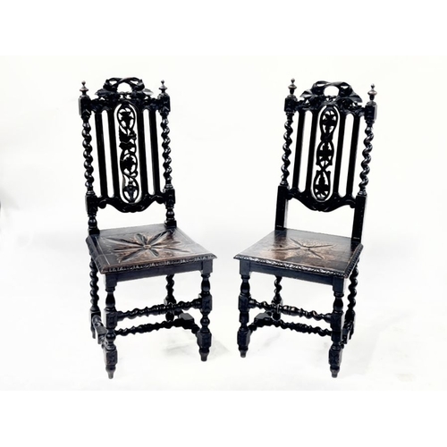 849 - A pair of Carolean style oak panel seat dining chairs (2)