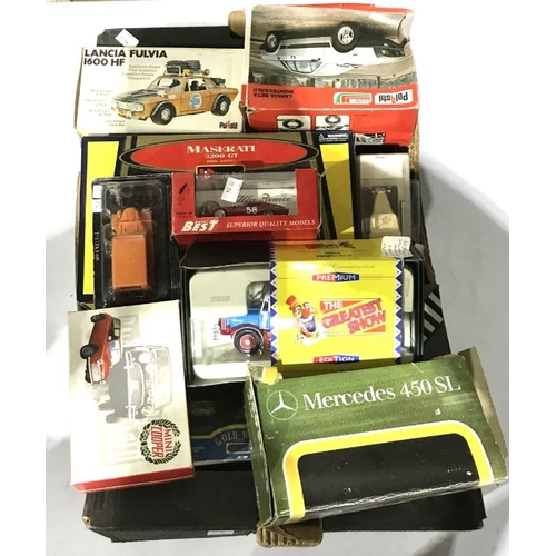 13 - A collection of model and toy cars and vehicles, makers include Burago, Corgi, Solido, Polinstil etc... 