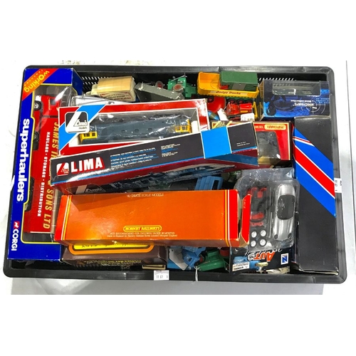 33 - A collection of model cars and toys, boxed and unboxed, to include Lima Models, Hornby R.431, Solido... 