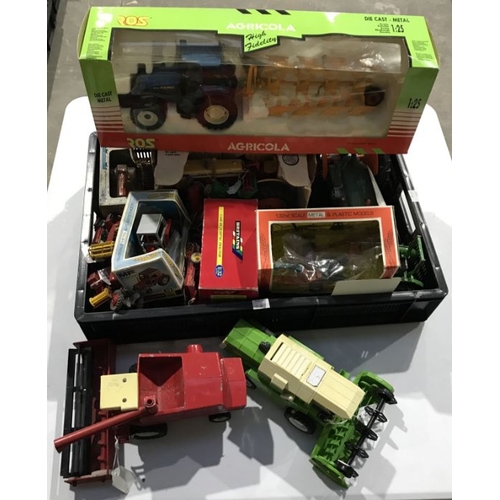 47 - A collection of die-cast and plastic model agricultural tractors and implements, to include a Ros 1:... 