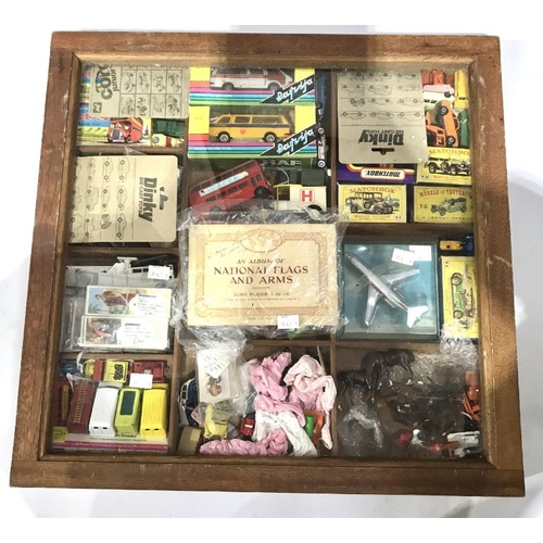 56 - A collection of die-cast cars and toys in wooden case, some boxed, to include Matchbox Models of Yes... 