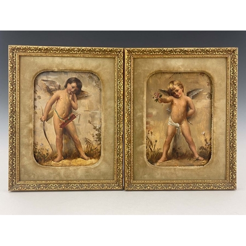 209 - A pair of Goldscheider wall plaques, late 19th Century, each painted with a standing winged cherub, ... 